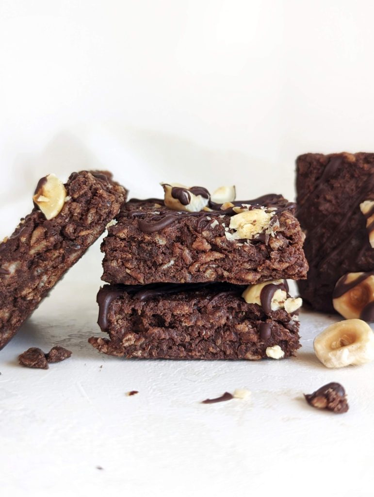 Decadent Protein Nutella Rice Krispie Treats for an easy, healthy, no bake snack. These Nutella rice crispy treats have no marshmallow, and use protein powder and sugar-free chocolate nut butter spread too.