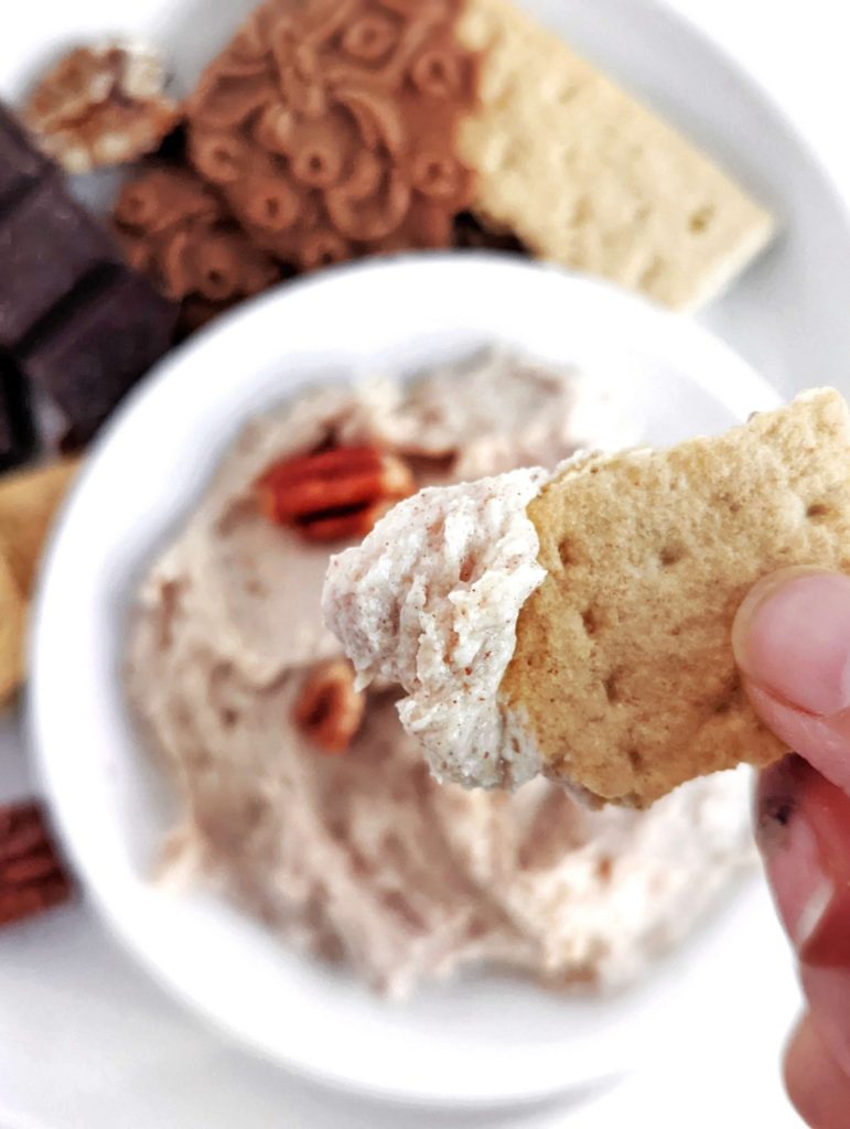 A sweet and creamy Protein Pecan Dip made with pecan butter, protein powder and Greek yogurt. This healthy pecan dip is great for apples, dessert with crackers or a spread on toast.