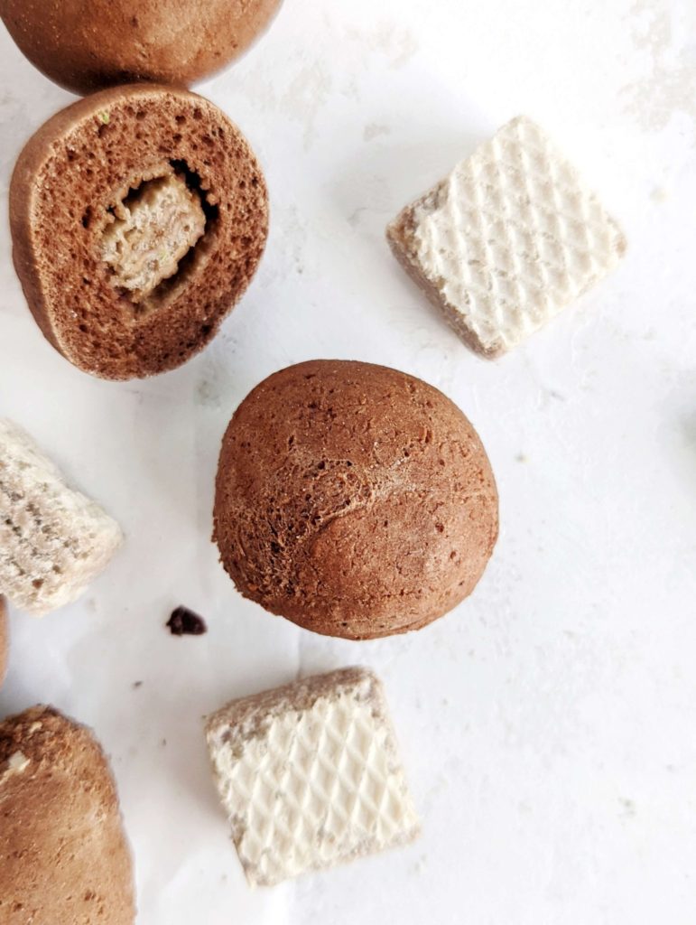 Soft Baked Chocolate Protein Balls with a crunchy Kitkat center! These baked energy bites use protein powder and Greek yogurt for a healthy and low calorie snack.