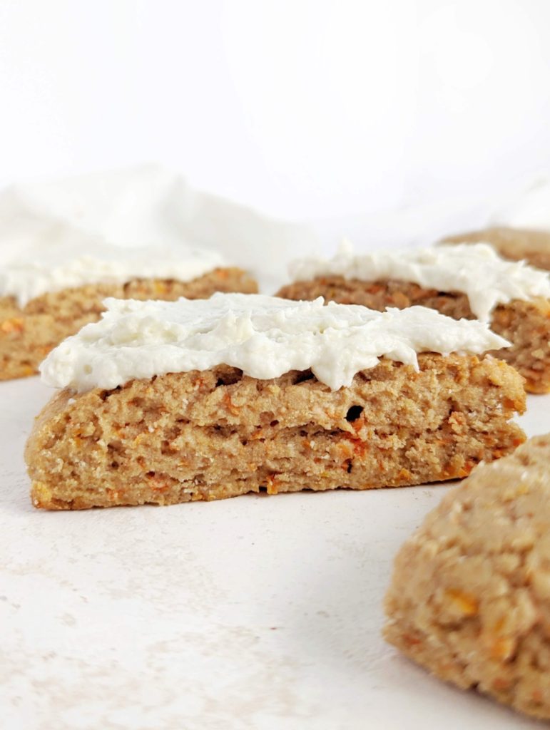 Unbelievable Carrot Cake Protein Scones with all the carrot cake flavor and a frosting too! These healthy carrot scones use protein powder for sweetener and yogurt for even more protein; Vegan and Gluten free options too!