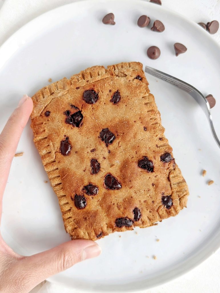 The perfect Chocolate Chip Protein Pop Tarts recipe with no sugar! This healthy chocolate chip pop tart uses protein powder and sugar free chocolate, and can be air fried or baked.