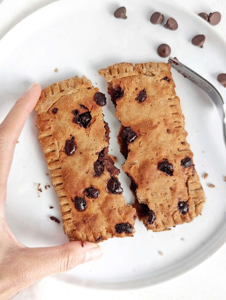 The perfect Chocolate Chip Protein Pop Tarts recipe with no sugar! This healthy chocolate chip pop tart uses protein powder and sugar free chocolate, and can be air fried or baked.