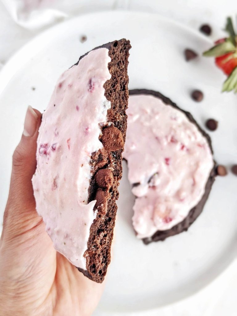 Unbelievably good Chocolate Strawberry Cheesecake Protein Cookie like healthy Crumbl copycat recipe. This chocolate strawberry protein cookie is gluten free, and has no butter or sugar!
