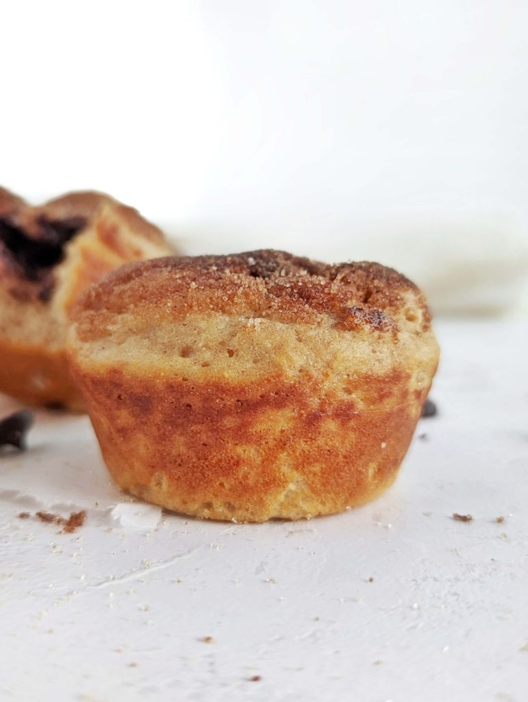 Surprise Chocolate Stuffed Churro Protein Muffins like fresh soft churros and dipping sauce in one! These healthy cinnamon sugar protein muffins are sweetened with protein powder and use sugar free chocolate and cinnamon-’sugar’ topping!