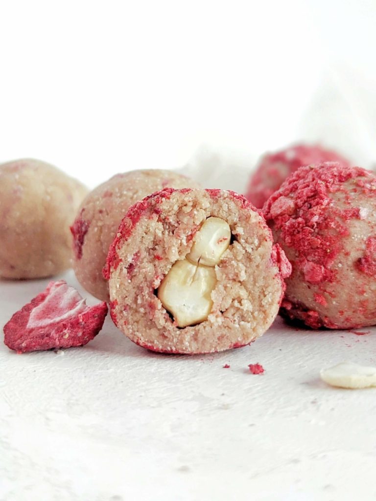 Pretty and perfect Strawberry Protein Balls with the crunch of a cashew inside! Strawberry protein bites are healthy, low carb, low fat, gluten free and have no sugar added!
