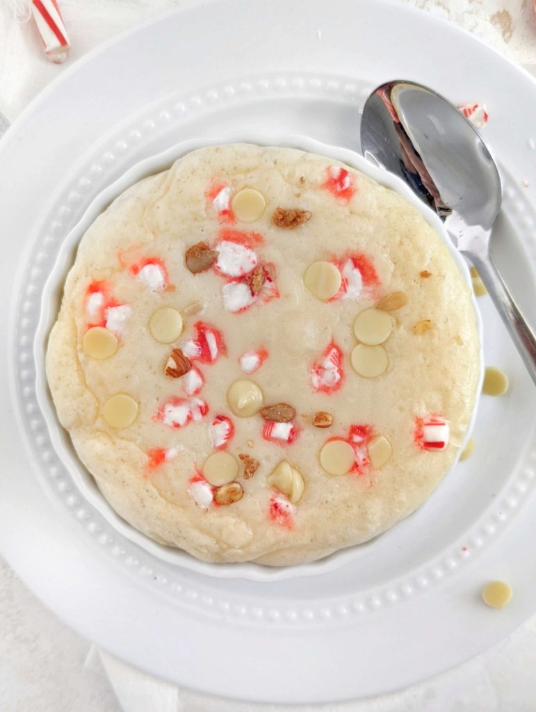 A perfect White Chocolate Peppermint Protein Mug Cake for an easy and healthy Christmas treat! This peppermint mug cake has 5 ingredients, the toppings and is a keto-friendly, and gluten free dessert for one.