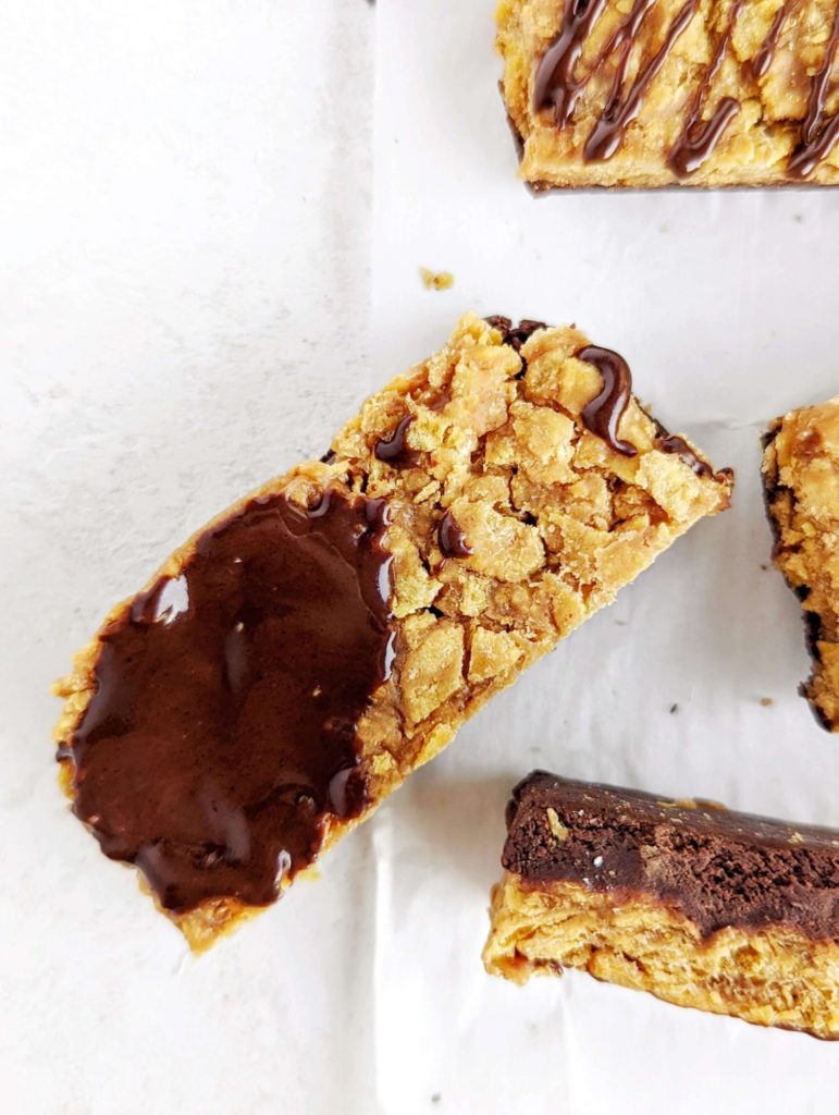 Homemade Butterfinger Protein Bars for your sugar free candy bar cravings with actual nutrition! This healthy Butterfinger recipe is made with corn flakes cereal, protein powder and creamy + powdered peanut butter and has no candy corn!