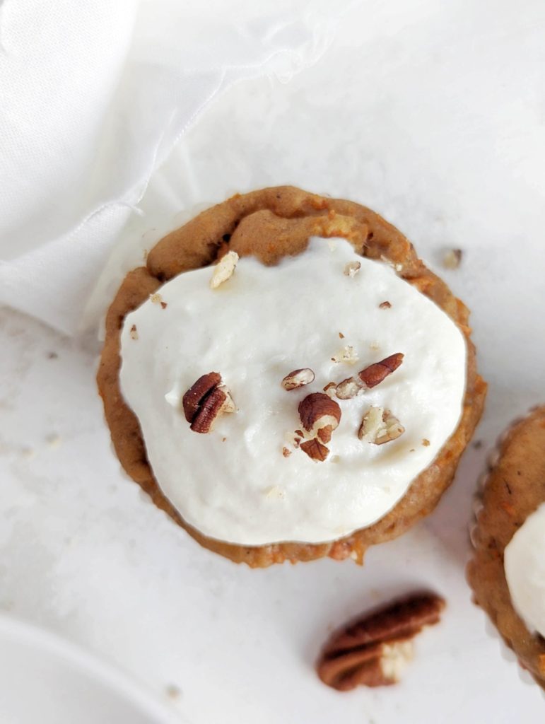 Just unbelievable Carrot Cake Protein Cupcakes topped with Protein Cream Cheese Frosting! Healthy carrot cake cupcakes use protein powder for sweetener, have very little oil and are a great low calorie, sugar free, low fat and high protein Easter dessert!