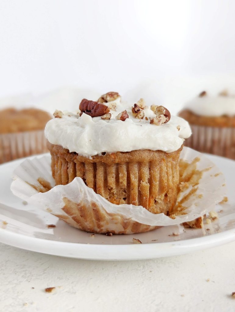 Just unbelievable Carrot Cake Protein Cupcakes topped with Protein Cream Cheese Frosting! Healthy carrot cake cupcakes use protein powder for sweetener, have very little oil and are a great low calorie, sugar free, low fat and high protein Easter dessert!