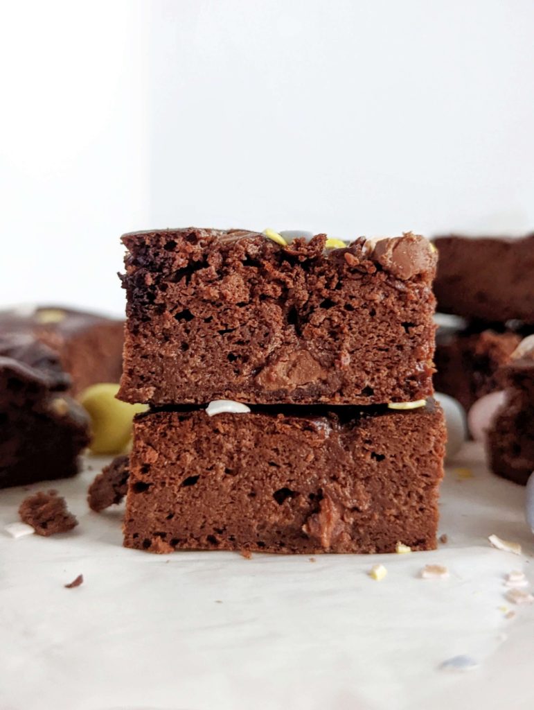 Amazing Mini Egg Protein Brownies made with a ton of protein powder and Greek yogurt, for an Easter desert! Healthy mini egg brownies are gluten free, butter-free and easily Vegan too!