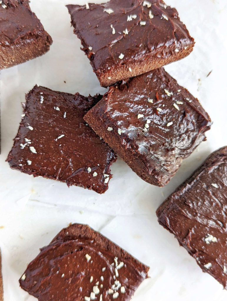 Amazing fudgy No Bake Protein Brownies with a rich base and indulgent topping! These healthy no bake brownies use protein powder and oat flour, and have no dates; Sugar free and gluten free!