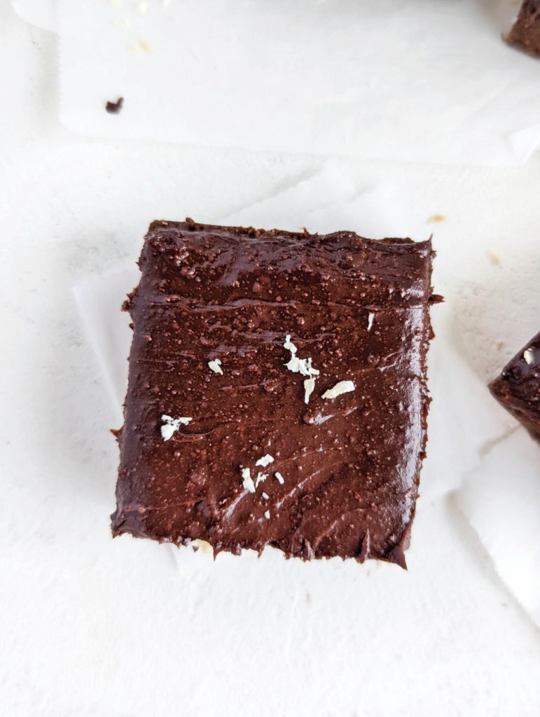 Amazing fudgy No Bake Protein Brownies with a rich base and indulgent topping! These healthy no bake brownies use protein powder and oat flour, and have no dates; Sugar free and gluten free!