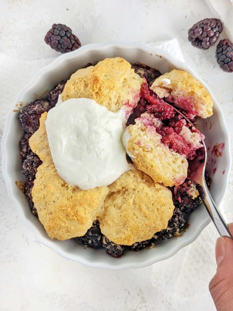 A beautiful Protein Blackberry Cobbler for one with no added sugar, and low fat! Single serve blackberry cobbler uses protein powder and yogurt for a healthy breakfast or dessert.