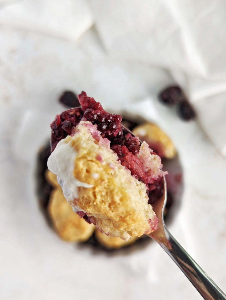 A beautiful Protein Blackberry Cobbler for one with no added sugar, and low fat! Single serve blackberry cobbler uses protein powder and yogurt for a healthy breakfast or dessert.