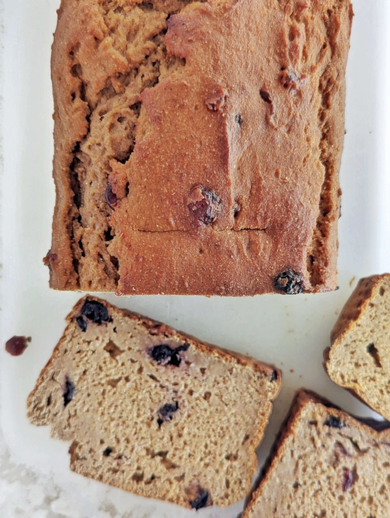 A sweet and soft Protein Cinnamon Raisin Bread with no added sugar, oil or butter! This healthy cinnamon raisin bread recipe uses protein powder, stevia sweetener and applesauce too for a guilt-free loaf!
