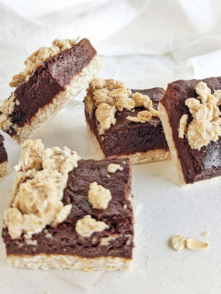 Just amazing Protein Oatmeal Fudge Bars with a protein oat cookie base and protein chocolate fudge too! Healthy chocolate oatmeal fudge bars have no oil, butter, sugar, or flour!