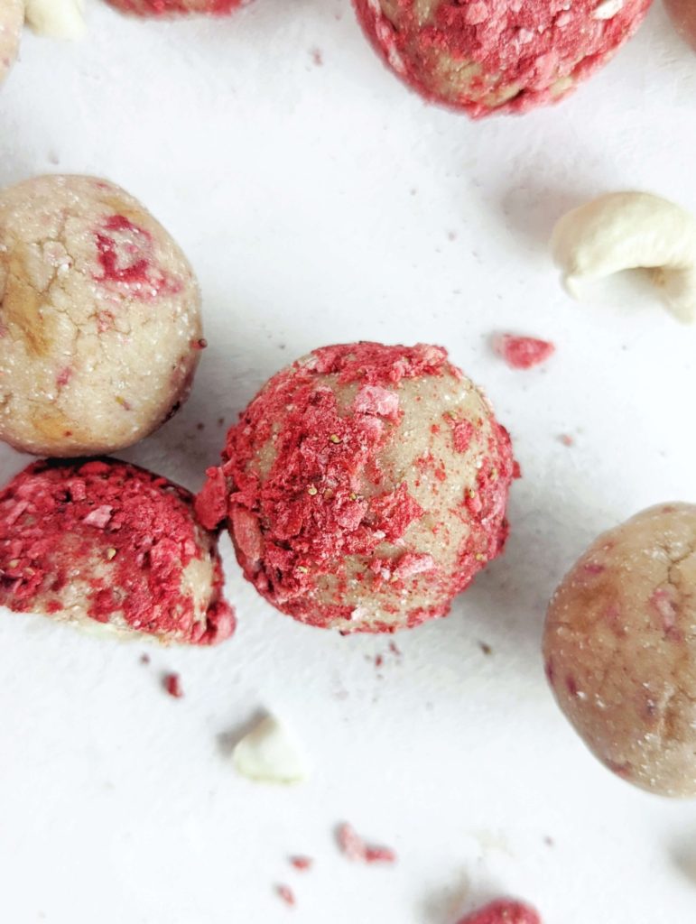 Pretty and perfect Strawberry Protein Balls with the crunch of a cashew inside! Strawberry protein bites are healthy, low carb, low fat, gluten free and have no sugar added!
