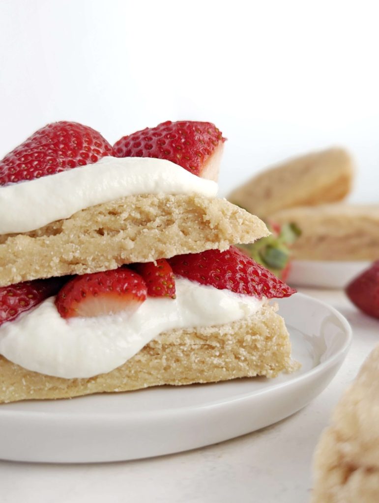 Delicate and super delicious Protein Strawberry Shortcake recipe with a protein scone base and cream layer too. Healthy strawberry shortcake uses protein powder and Greek yogurt and has no sugar, butter, or heavy cream.