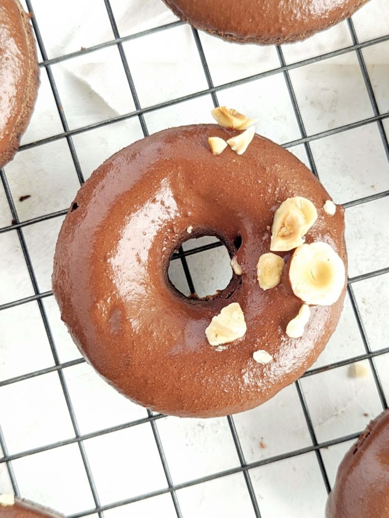 Superb Nutella Protein Donuts made healthy with protein powder and sugar-free nut butter substitute! These chocolate hazelnut protein donuts are baked and have no oil or butter either.