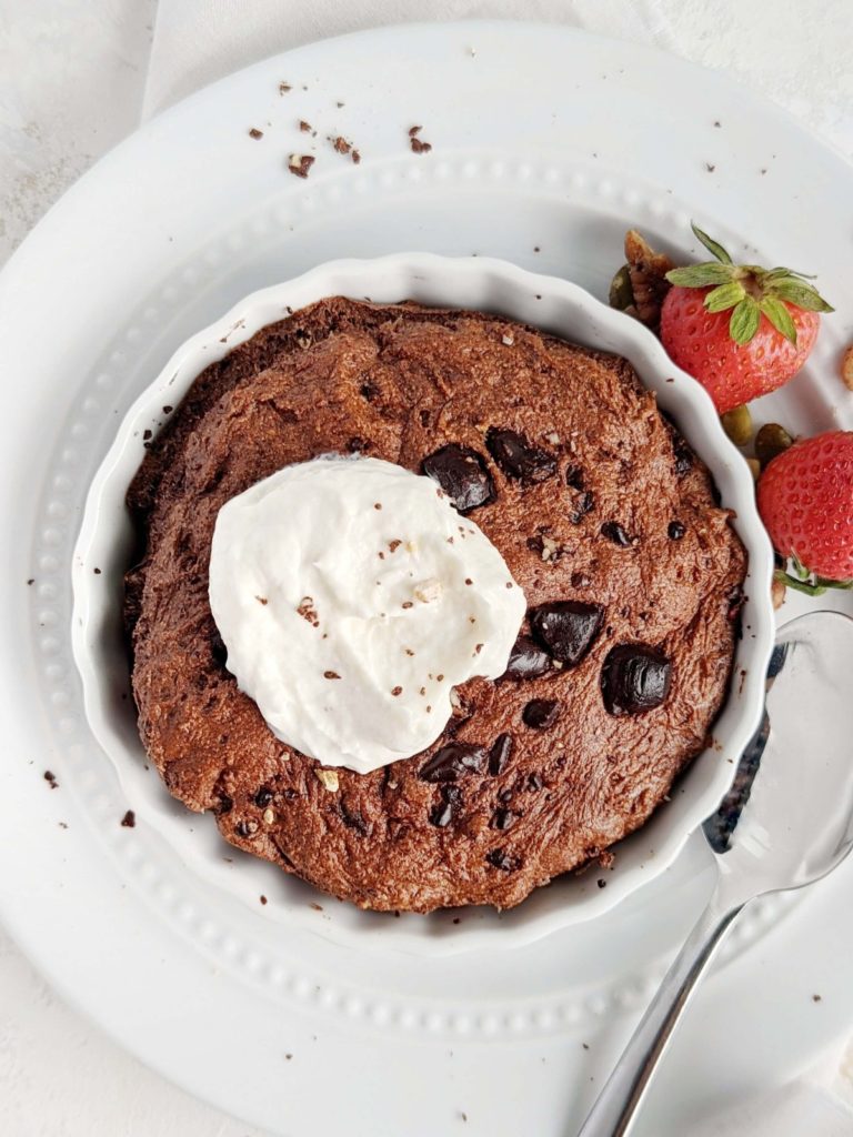 The quickest Air Fryer Protein Brownie recipe with a fudgy center in under 10 minutes! This single serve air fryer protein fudge brownie is sugar free (uses chocolate protein powder), gluten free and low calorie too - an amazing healthy dessert!