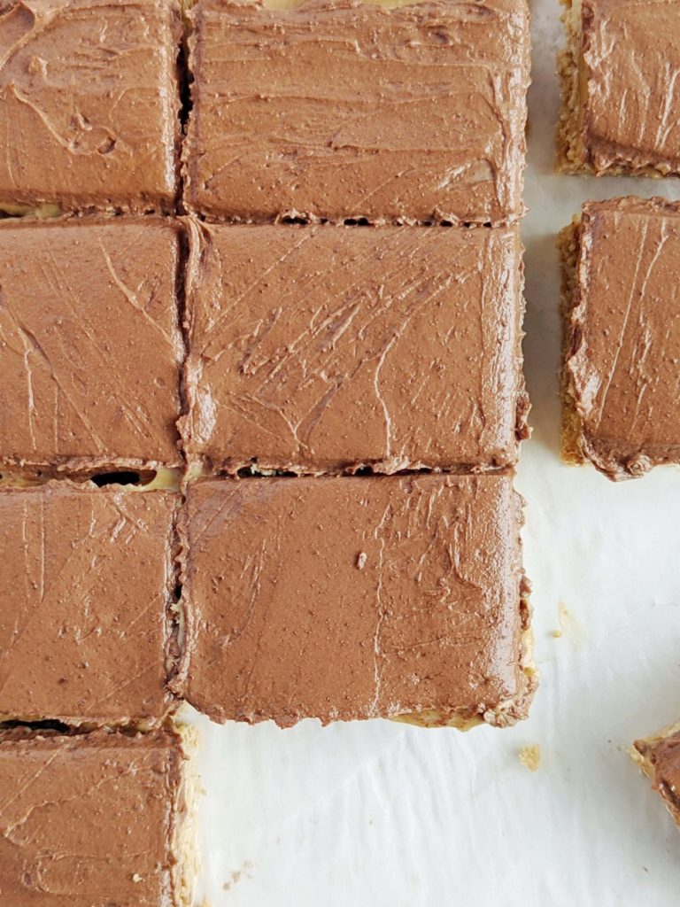 Soft and chewy Lunch Lady Peanut Butter Protein Bars but healthy, sugar free and gluten free! These lunch lady peanut butter squares have a peanut butter oatmeal cookie base, peanut butter and chocolate frosting - all high protein.
