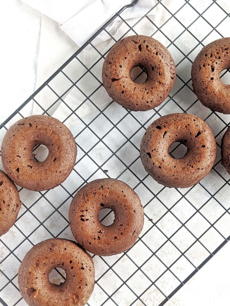 Superb Nutella Protein Donuts made healthy with protein powder and sugar-free nut butter substitute! These chocolate hazelnut protein donuts are baked and have no oil or butter either.