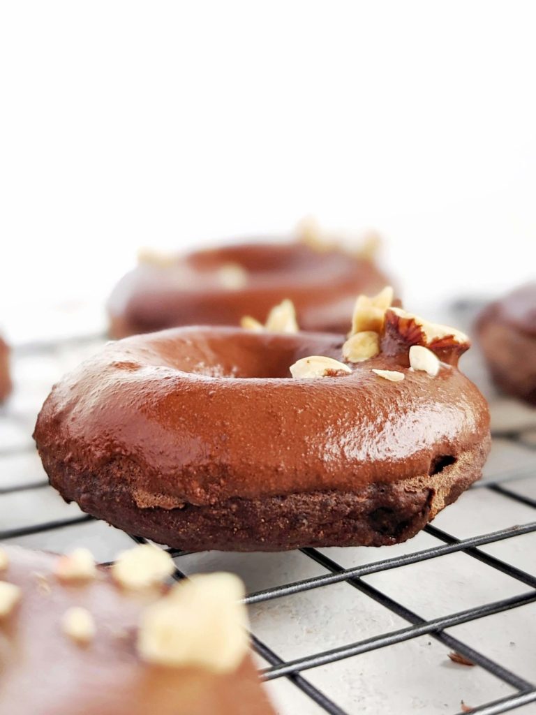 Superb Nutella Protein Donuts made healthy with protein powder and sugar-free nut butter substitute! These chocolate hazelnut protein donuts are baked and have no oil or butter either.
