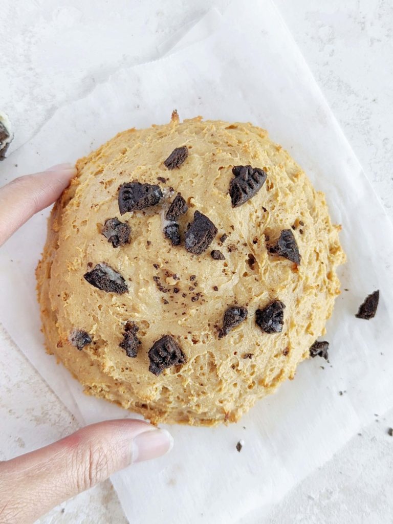 A big Oreo stuffed Peanut Butter Protein Cookie with good flavor and nutrition! A healthy single serving Oreo stuffed peanut butter cookie with no butter or sugar and made using oat flour.