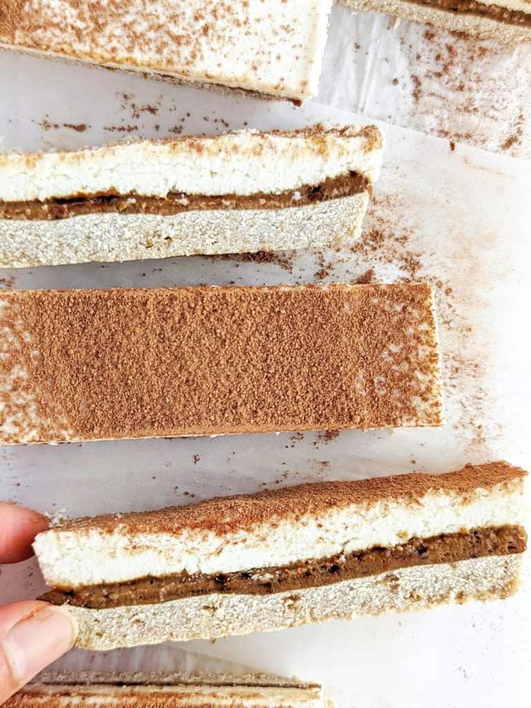 Just amazing Tiramisu Protein Bars with a protein base, coffee caramel and cream layer! These easy, healthy tiramisu bars are sugar free, gluten free and low fat too!