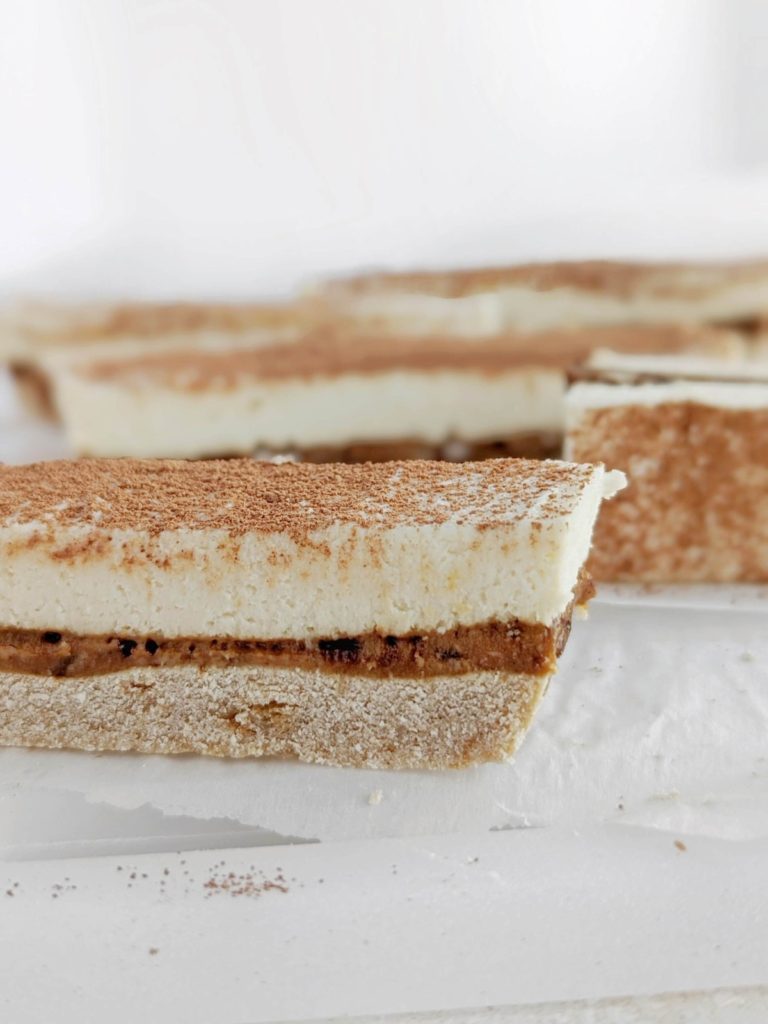 Just amazing Tiramisu Protein Bars with a protein base, coffee caramel and cream layer! These easy, healthy tiramisu bars are sugar free, gluten free and low fat too!