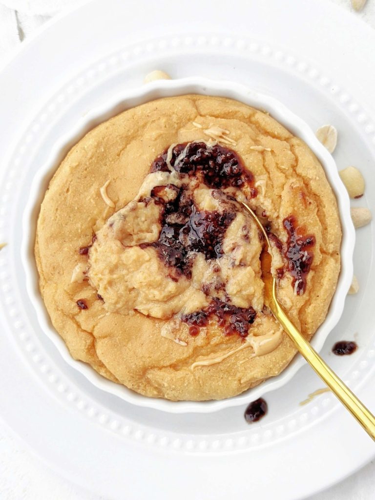 A quick and easy PB&J Protein Mug Cake for the perfect single serve dessert! This peanut butter and jelly protein mug cake is low fat, low carb, low sugar, high protein and gluten free too.