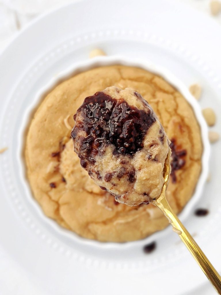A quick and easy PB&J Protein Mug Cake for the perfect single serve dessert! This peanut butter and jelly protein mug cake is low fat, low carb, low sugar, high protein and gluten free too.