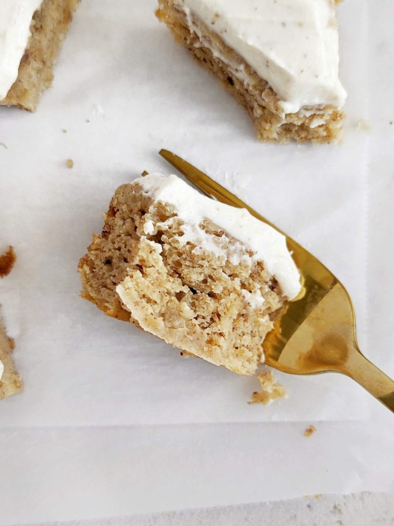 Flavorful Banana Protein Blondies topped with Protein Frosting - a healthy dessert to satisfy the cravings! Banana blondies use protein powder and are low sugar, and low fat too!