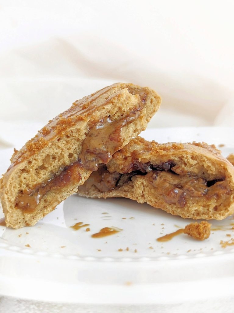 Triple Biscoff Stuffed Protein Cookie with crushed Biscoff biscuits in the dough, Speculoos protein powder and a cookie butter lava filling. These high protein Biscoff lava cookies are a healthy way to hit that Speculoos cookie butter craving.