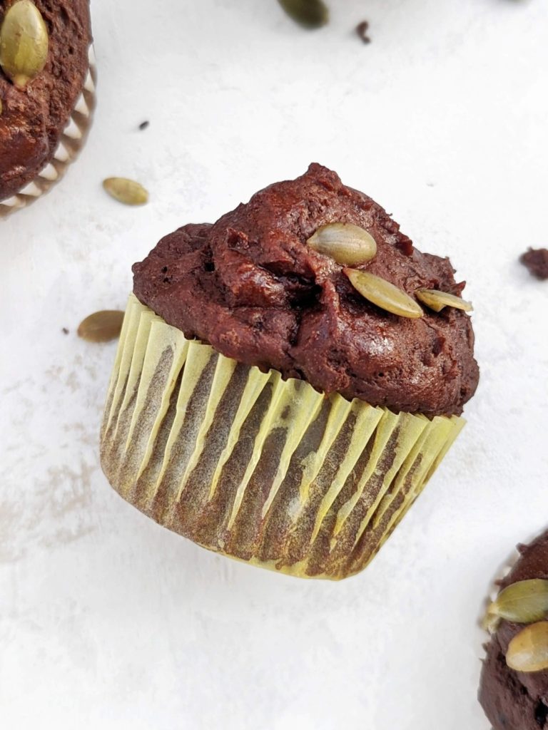 Amazing Chocolate Pumpkin Protein Muffins with the fall flavor and chocolate, for an indulgent cozy treat! Healthy chocolate pumpkin muffins use protein powder for sweetness and have no sugar, oil or butter.