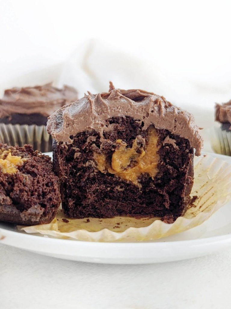 Chocolate Pumpkin Protein Cupcakes with a protein pumpkin filling and protein chocolate frosting! Full of pumpkin spice flavor, these cupcakes are healthy, low fat and sugar-free too.