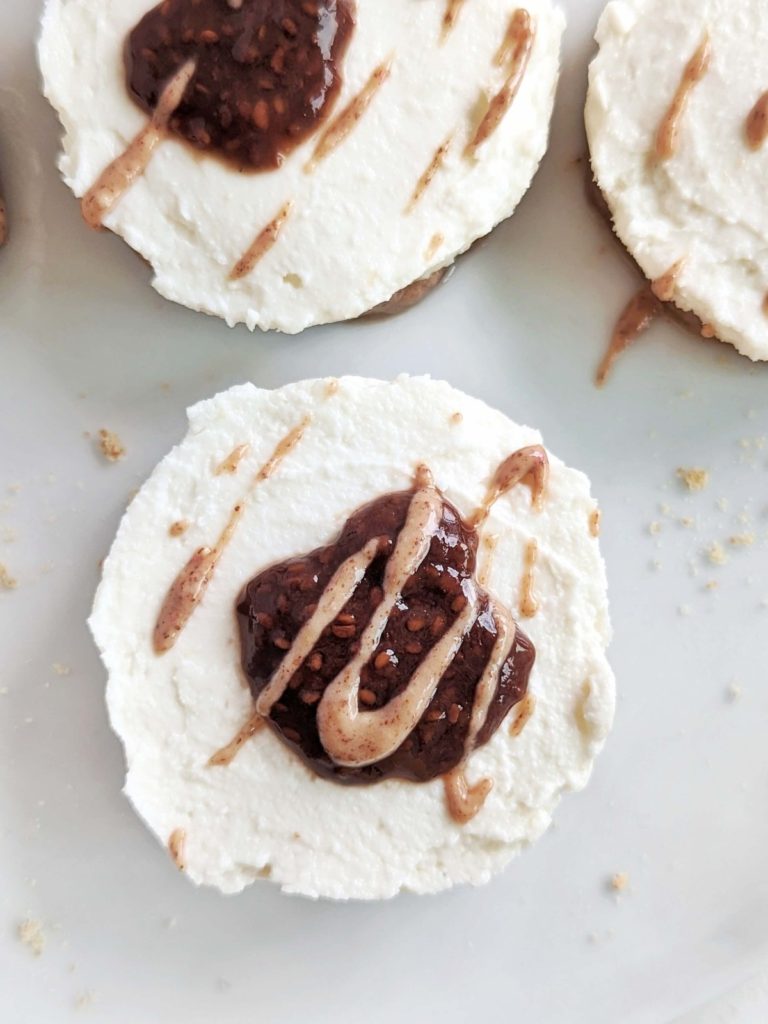 This No Bake Mini Protein Cheesecake with Greek yogurt and reduced fat cream cheese for an easy and healthy cheesecake recipe. No bake protein powder cheesecake bites are great for a portion control dessert or entertaining guests too.