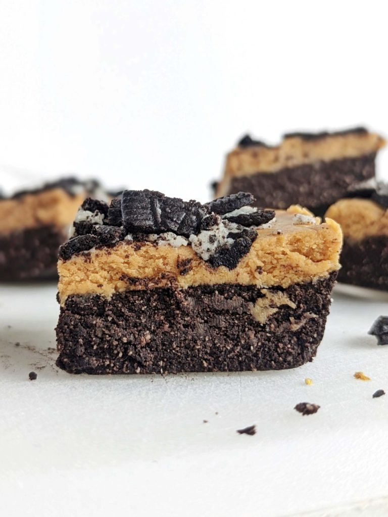 Super flavorful Oreo Peanut Butter Protein Bars for your next post-workout snack! Easy, healthy, no bake Oreo peanut butter bars use protein powder for sweetness and are low fat, low calorie and gluten free too.