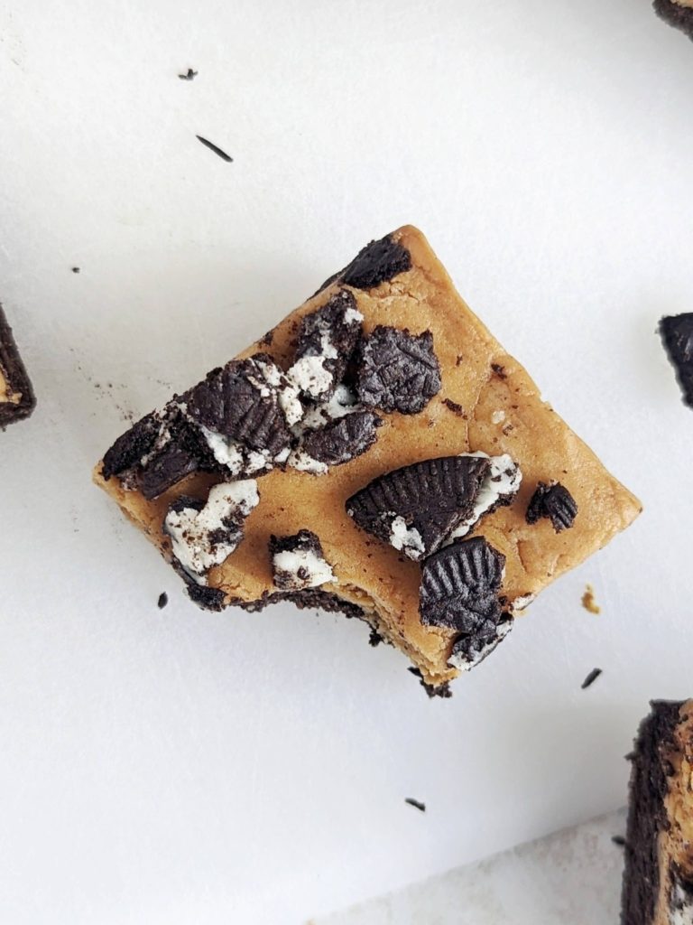 Super flavorful Oreo Peanut Butter Protein Bars for your next post-workout snack! Easy, healthy, no bake peanut butter bars use protein powder for sweetness and are low fat, low calorie and gluten free too.