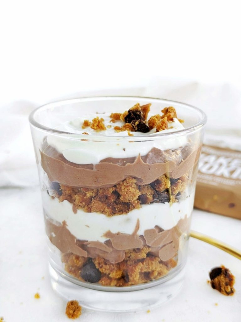A perfect Protein Chocolate Chip Cookie Trifle with a protein cookie, chocolate pudding and vanilla yogurt. Healthy cookie dough trifle for one with no sugar or whipped cream either.