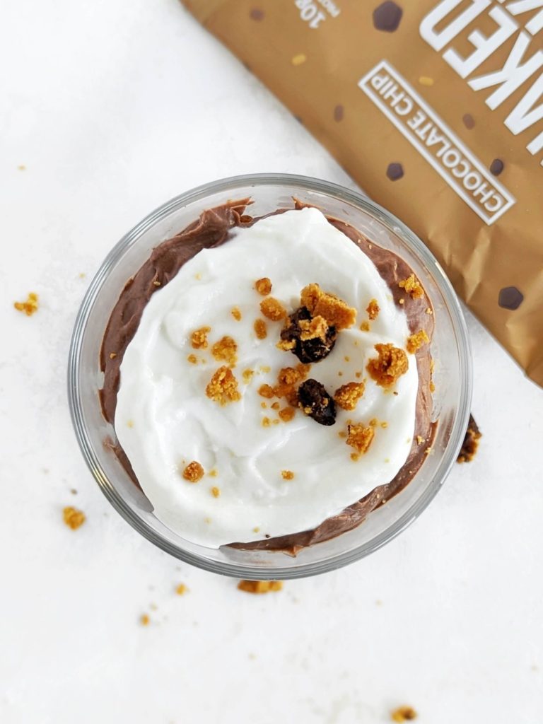 A perfect Protein Chocolate Chip Cookie Trifle with a protein cookie, chocolate pudding and vanilla yogurt. Healthy cookie dough trifle for one with no sugar or whipped cream either.