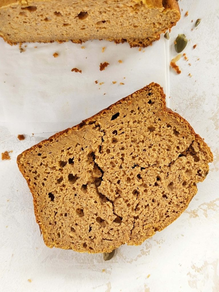 A delicious Protein Pumpkin Bread with whole wheat flour, protein powder and no oil or butter. East and healthy protein powder pumpkin bread with no sugar either; A great high protein post-workout treat or pumpkin spice breakfast!