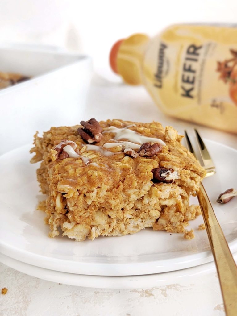 Make-ahead Pumpkin Kefir Baked Oatmeal with pumpkin spice flavored kefir gives extra cozy fall vibes. Healthy pumpkin kefir baked oats uses protein powder and egg whites for even more protein, and no sugar!