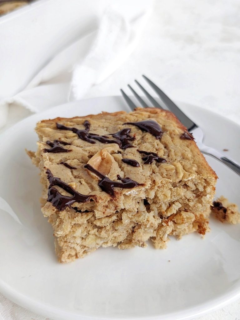 Bake a batch of these soft and chewy Banana Protein Baked Oatmeal Bars with all the sweet flavor of protein bar without fat or added sugar! The perfect high protein breakfast, snack or post workout meal.