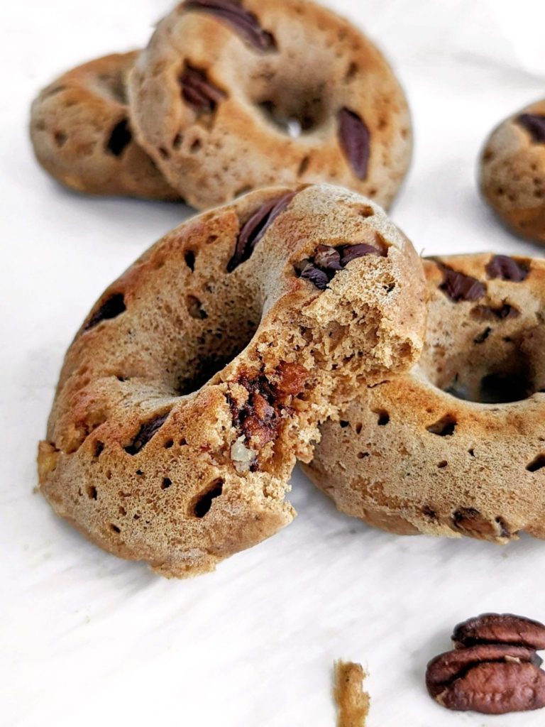 Super easy and high protein Fruitcake Donuts with no sugar added are perfect for Christmas! Healthy fruit cake donuts use protein powder for sweetness, but have all the spiced flavor and dried fruits you’d expect in this treat.