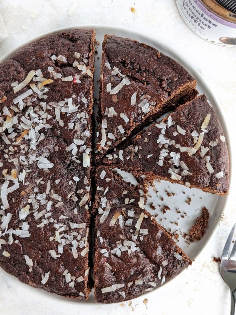 Indulge in this Chocolate Protein Cookie Cake made with chocolate protein powder, chocolate almond butter and cocoa powder. Rich and healthy chocolate cookie cake is sugar free and low fat!