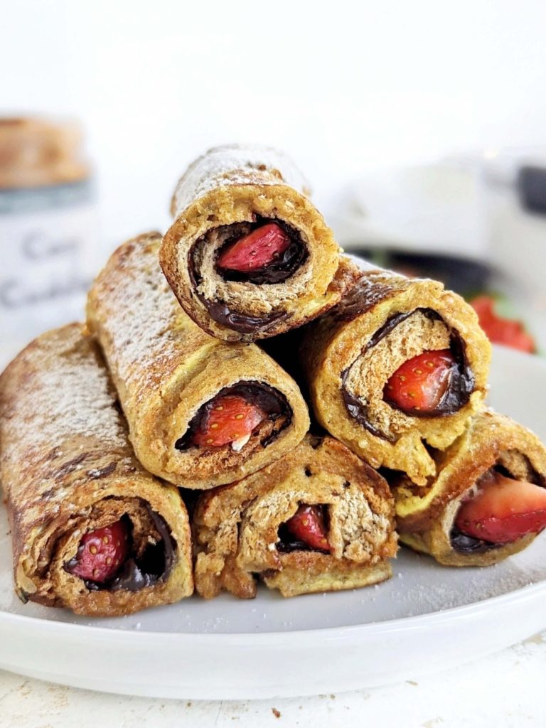 Perfect Protein French Toast Rolls with a high-protein chocolate spread and strawberry filling! Healthy french toast roll ups use protein powder and have no sugar added.