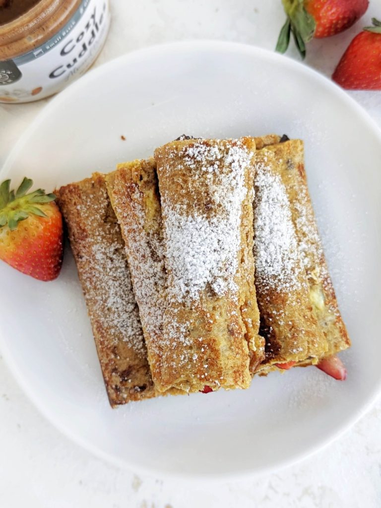 Perfect Protein French Toast Rolls with a high-protein chocolate spread and strawberry filling! Healthy french toast roll ups use protein powder and have no sugar added.