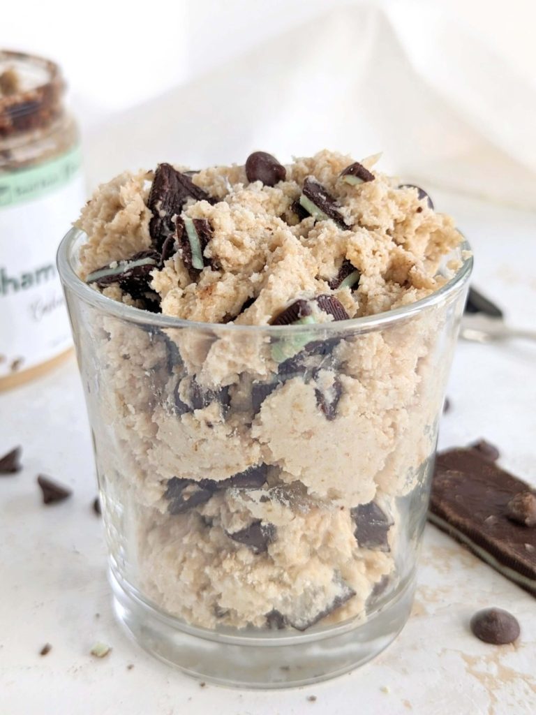 Indulgent and refreshing Mint Chocolate Chip Protein Cookie Dough - a healthy minty cookie dough made with protein powder and mint cashew butter loaded with sugar-free chocolate chips and mint chocolate candies!