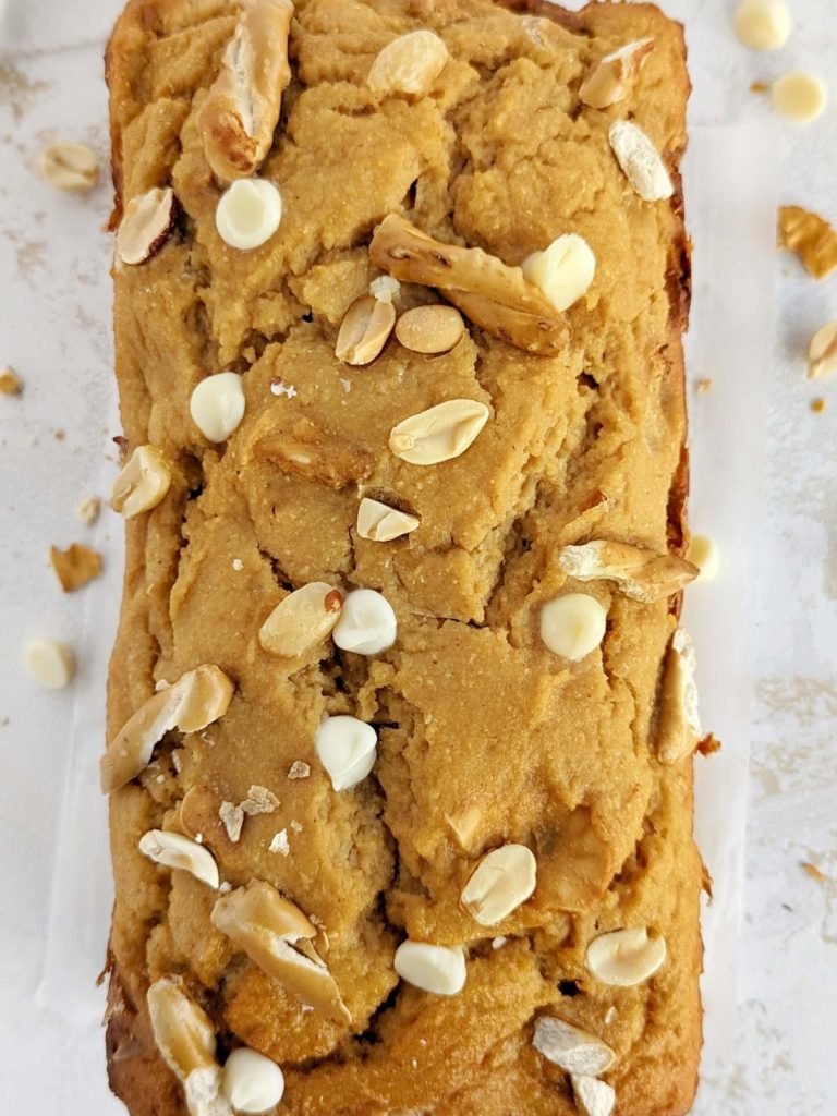 Loaded Protein Peanut Butter Bread with white chocolate chips, pretzels and roasted peanuts to satisfy your cravings. Healthy peanut butter loaf uses flavored peanut butter and PB powder and is sweetened with protein powder!